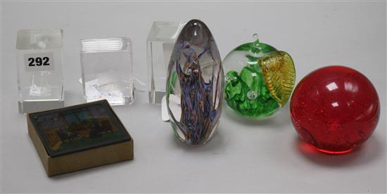 A box of eight coloured glass lantern slides, five various glass paperweights and a Stuart Crystal Book of Love